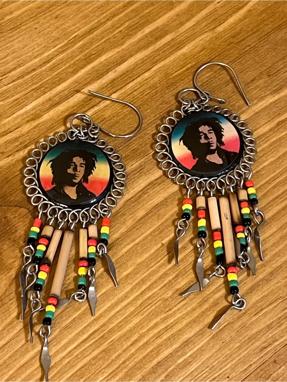 Reggae Bob Marley earrings with dangles of wood bead and feathers dangle 3 1/2”
